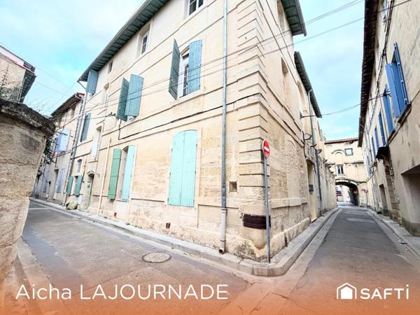 IMMEUBLE LOCATIF: APPARTEMENTS ET GARAGES!