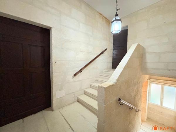 IMMEUBLE LOCATIF: APPARTEMENTS ET GARAGES!