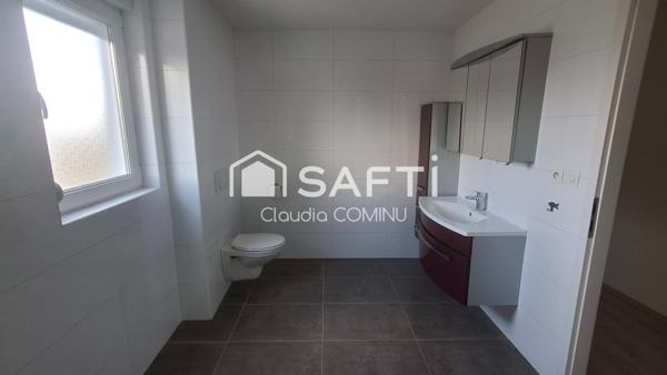 Appartement F4, d'environ 105 m2, avec terrasse, garage et cave