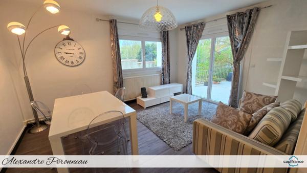 Appartement T2 avec terrasse, grand jardin privatif 160 m², garage et dépendance – petite copropriété sans charges