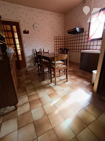 UNE MAISON