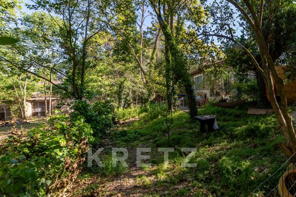 Propriété sur un terrain constructible de 3.500m² en coeur de ville