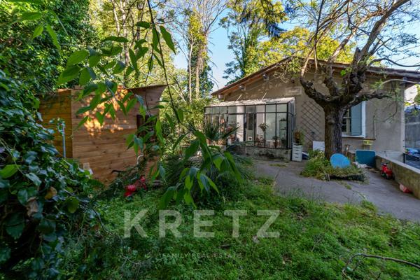 Propriété sur un terrain constructible de 3.500m² en coeur de ville