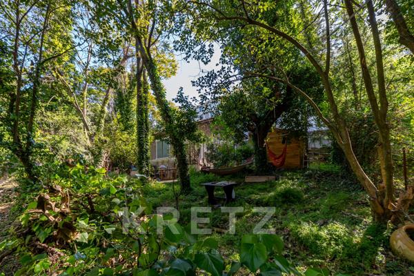 Propriété sur un terrain constructible de 3.500m² en coeur de ville