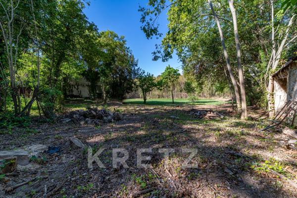 Propriété sur un terrain constructible de 3.500m² en coeur de ville