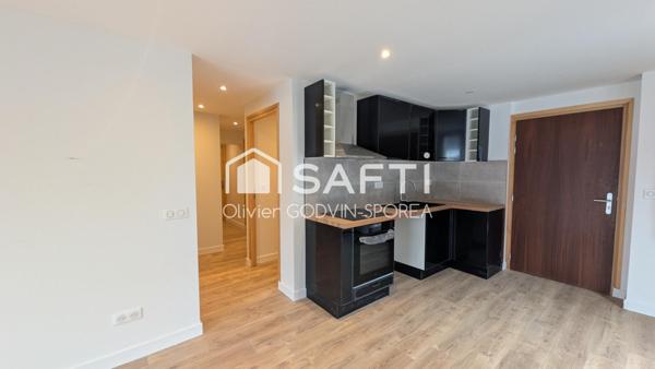 Appartement familiale en rez-de-chaussée de 60 m2 avec 2 chambres et un bureau et une place de parking extérieur