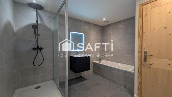 Appartement familiale en rez-de-chaussée de 60 m2 avec 2 chambres et un bureau et une place de parking extérieur