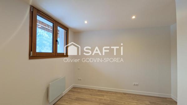 Appartement familiale en rez-de-chaussée de 60 m2 avec 2 chambres et un bureau et une place de parking extérieur