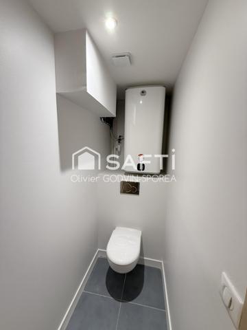 Appartement familiale en rez-de-chaussée de 60 m2 avec 2 chambres et un bureau et une place de parking extérieur