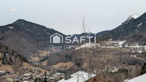 Appartement familiale en rez-de-chaussée de 60 m2 avec 2 chambres et un bureau et une place de parking extérieur