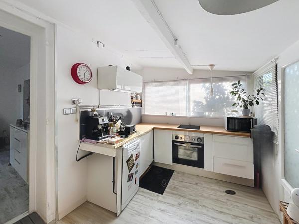 Appartement atypique en ville dans un coin de verdure