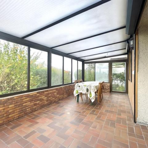 Maison spacieuse et conviviale avec véranda