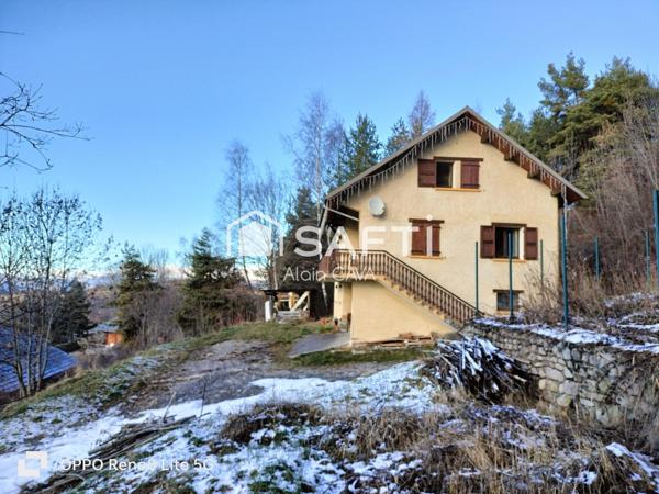 Maison de 238m² surface au sol( 124m² loi carrez )avec terrasse, garage de 89m², sur 2585m² de terrain