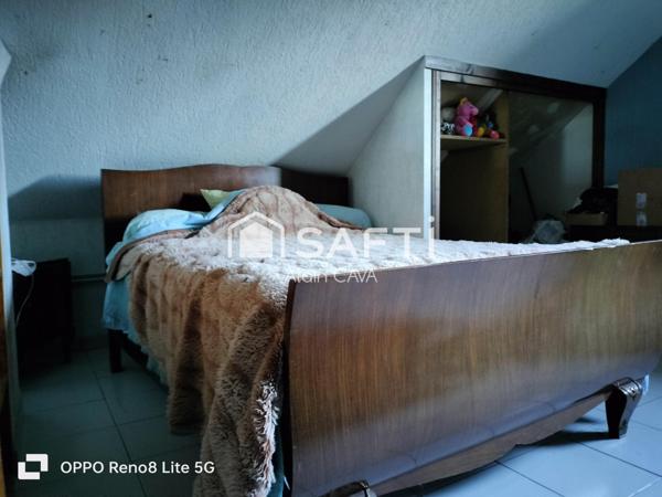 Maison de 238m² surface au sol( 124m² loi carrez )avec terrasse, garage de 89m², sur 2585m² de terrain