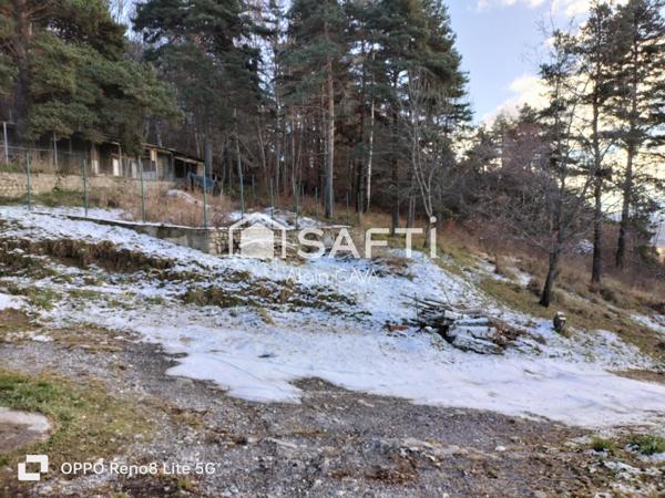 Maison de 238m² surface au sol( 124m² loi carrez )avec terrasse, garage de 89m², sur 2585m² de terrain