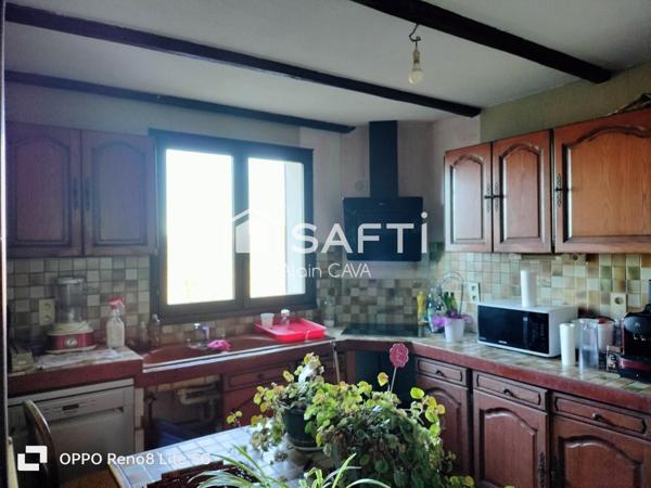 Maison de 238m² surface au sol( 124m² loi carrez )avec terrasse, garage de 89m², sur 2585m² de terrain