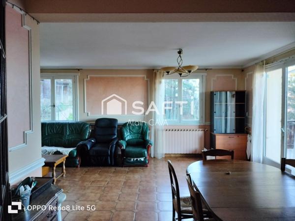 Maison de 238m² surface au sol( 124m² loi carrez )avec terrasse, garage de 89m², sur 2585m² de terrain