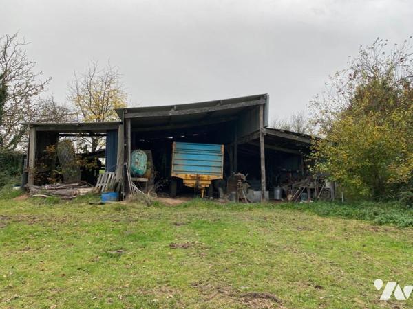 MAISON EN PIERRES AVEC BATIMENT ET TERRAIN