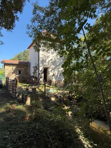 Ancien moulin à Caylus en partie rénové