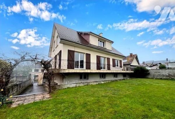 maison avec potentiel d'agrandissement.