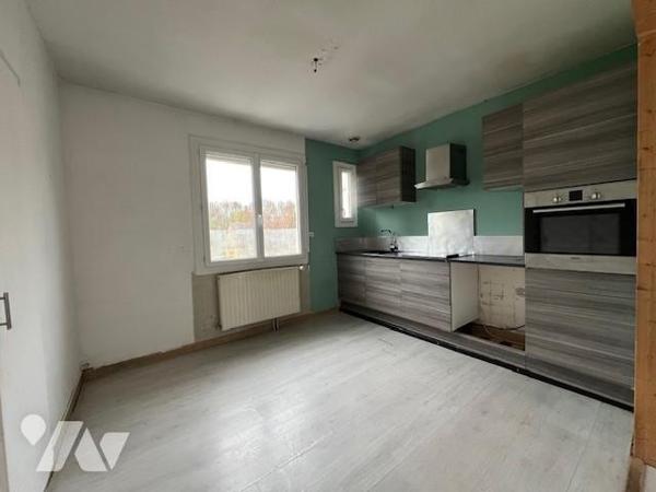 maison avec potentiel d'agrandissement.