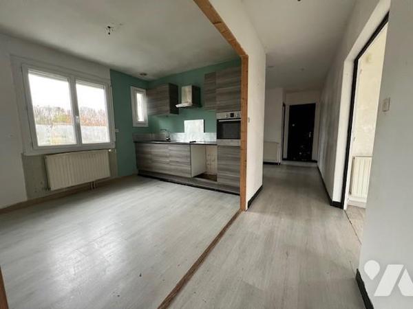 maison avec potentiel d'agrandissement.