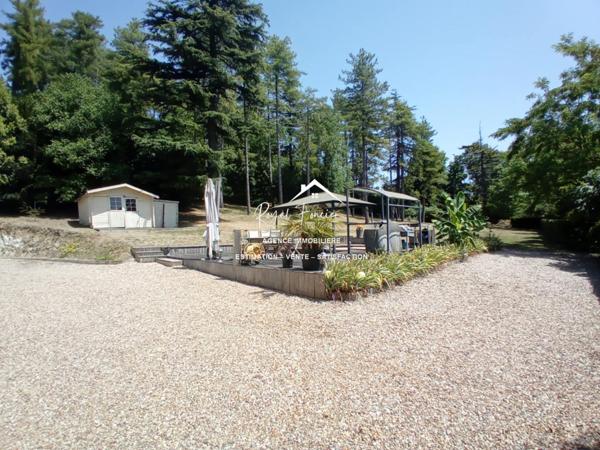 Vue sur la campagne, avec la partie boisée, un havre de paix