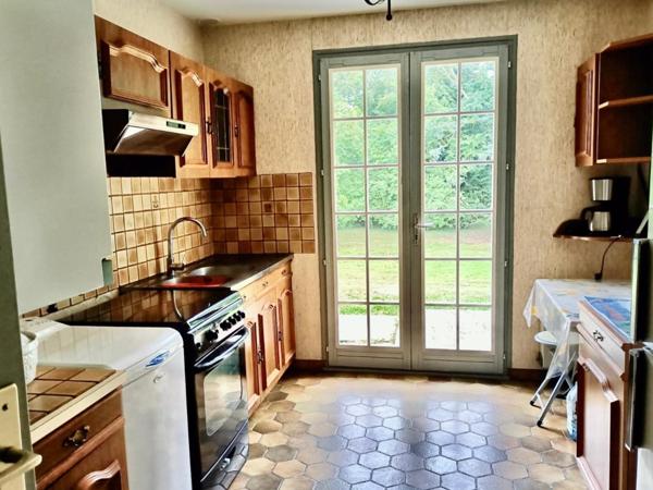 MAISON de plain-pied  avec sous-sol complet