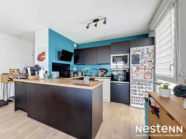 NESTENN - Grand T3 dans résidence récente avec terrasse et parking en sous-sol