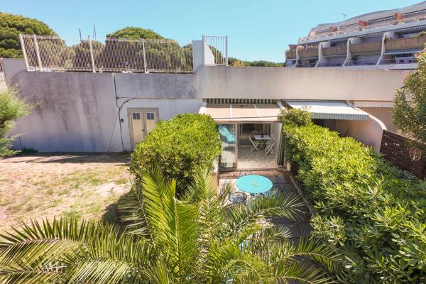 Appartement rez de jardin à Port Camargue - Résidence avec piscine
