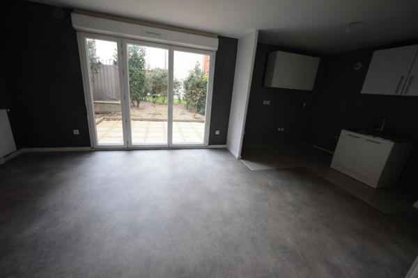 Beau 3 pièces de 54 m² en rez de jardin, dans résidence standing sécurisée