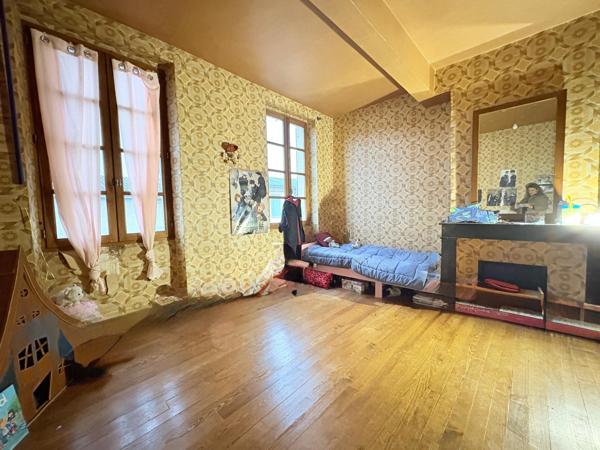 Immeuble mixte - 300m2-habitation et commerce