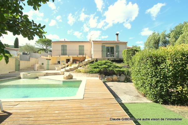 Vailhauquès (34570) Maison 7 pièces avec un grand sous-sol exploitable, piscine, jardin arboré à Vailhauquès