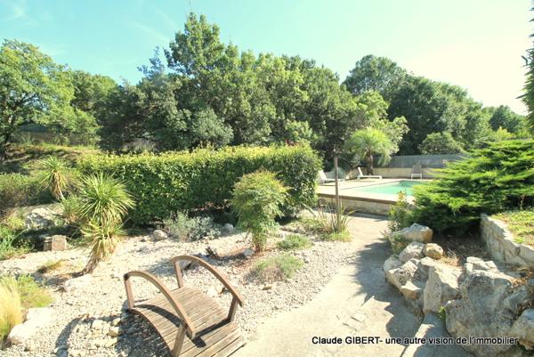 Vailhauquès (34570) Maison 7 pièces avec un grand sous-sol exploitable, piscine, jardin arboré à Vailhauquès