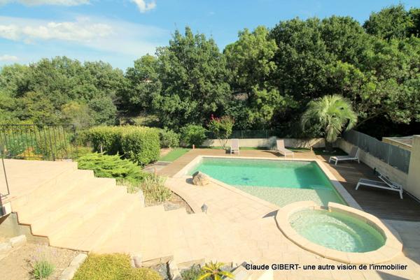 Vailhauquès (34570) Maison 7 pièces avec un grand sous-sol exploitable, piscine, jardin arboré à Vailhauquès