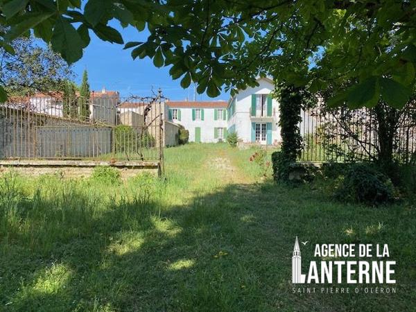MAISON BOURGEOISE EN PIERRE DE 368 M² SUR UN TERRAIN DE 1150 M² environ