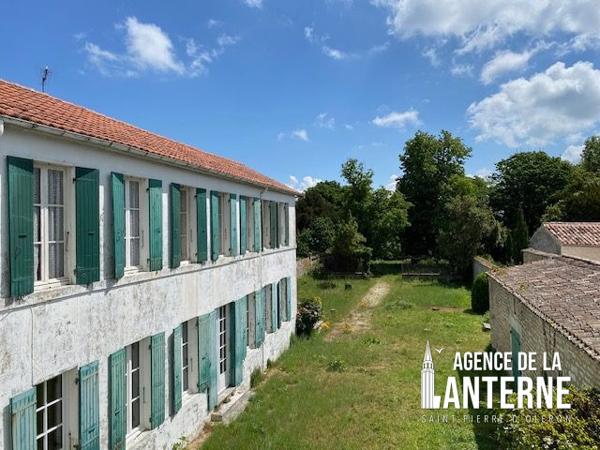 MAISON BOURGEOISE EN PIERRE DE 368 M² SUR UN TERRAIN DE 1150 M² environ