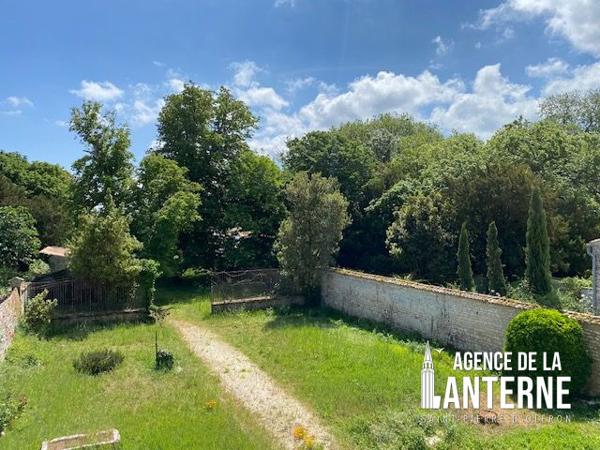 MAISON BOURGEOISE EN PIERRE DE 368 M² SUR UN TERRAIN DE 1150 M² environ