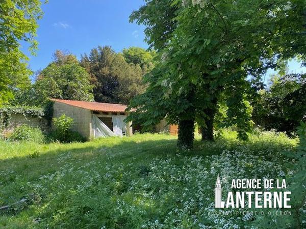 MAISON BOURGEOISE EN PIERRE DE 368 M² SUR UN TERRAIN DE 1150 M² environ