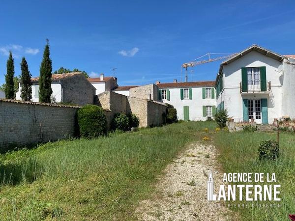 MAISON BOURGEOISE EN PIERRE DE 368 M² SUR UN TERRAIN DE 1150 M² environ