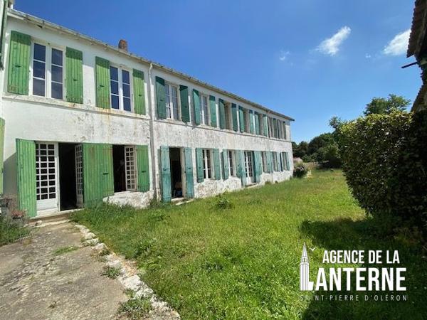 MAISON BOURGEOISE EN PIERRE DE 368 M² SUR UN TERRAIN DE 1150 M² environ