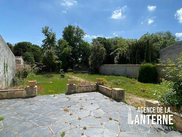 MAISON BOURGEOISE EN PIERRE DE 368 M² SUR UN TERRAIN DE 1150 M² environ
