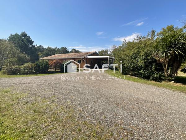 Sur parcelle de 2,5ha, maison avec garage attenant, carport et hangar séparé