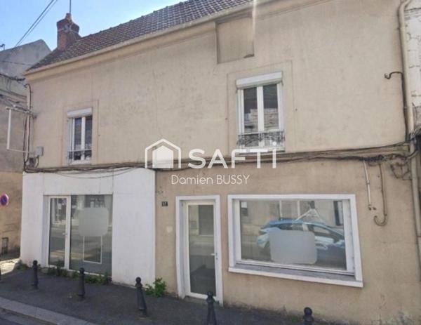 Immeuble composé d’un duplex et deux locaux commerciaux