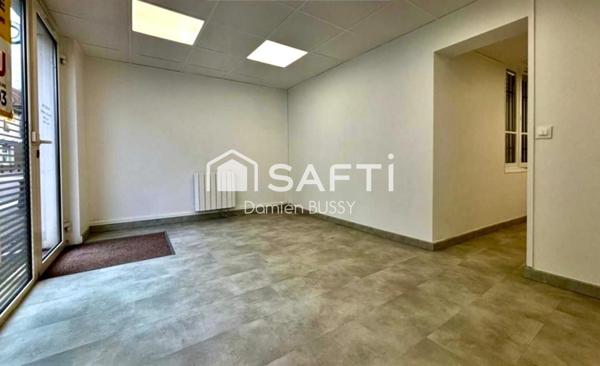 Immeuble composé d’un duplex et deux locaux commerciaux