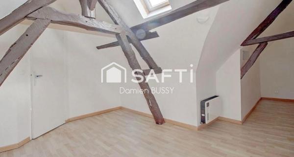 Immeuble composé d’un duplex et deux locaux commerciaux