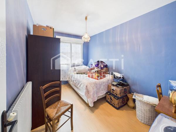 A Mérignac, appartement de 2 chambres - 56 m2 avec balcon, cave, et parking. Proche Tramway.