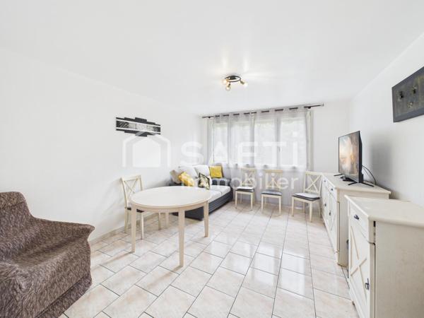 A Mérignac, appartement de 2 chambres - 56 m2 avec balcon, cave, et parking. Proche Tramway.