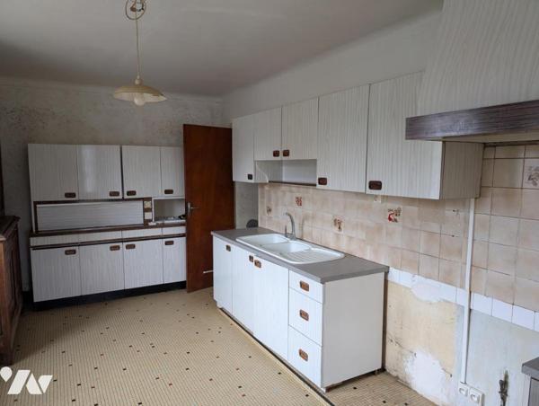 exclusivité longère en pierre avec terrain constructible en partie