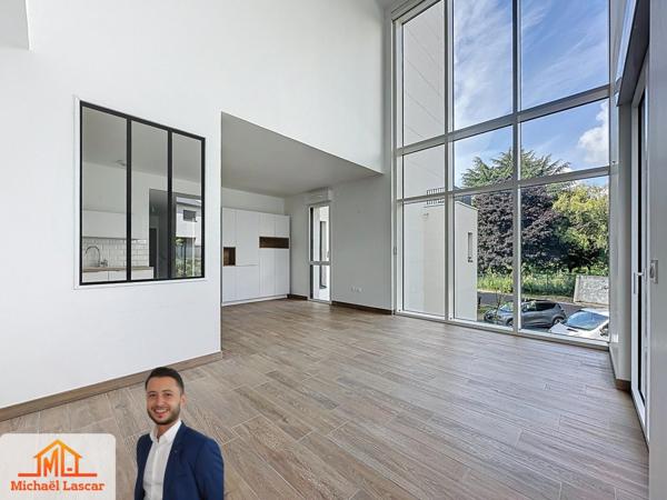 Duplex contemporain de prestige avec garage et cave